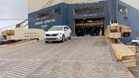 Ian Taylor agencia en Iquique M/N de EUKOR con vehículos y maquinaria con destino Bolivia